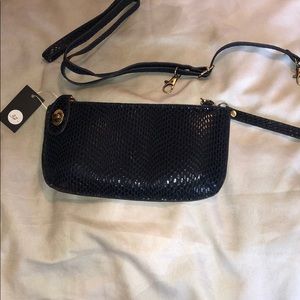 A dark blue and black purse